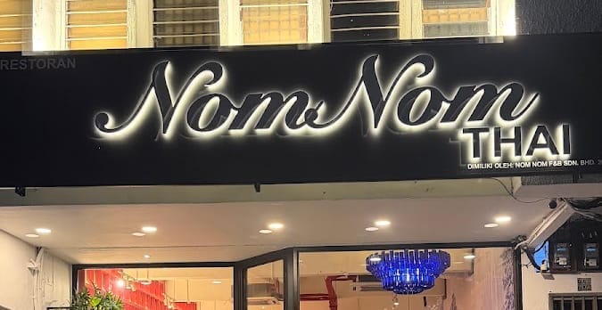 Pelangi outlet: “NomNom THAI” signboard above the shopfront
